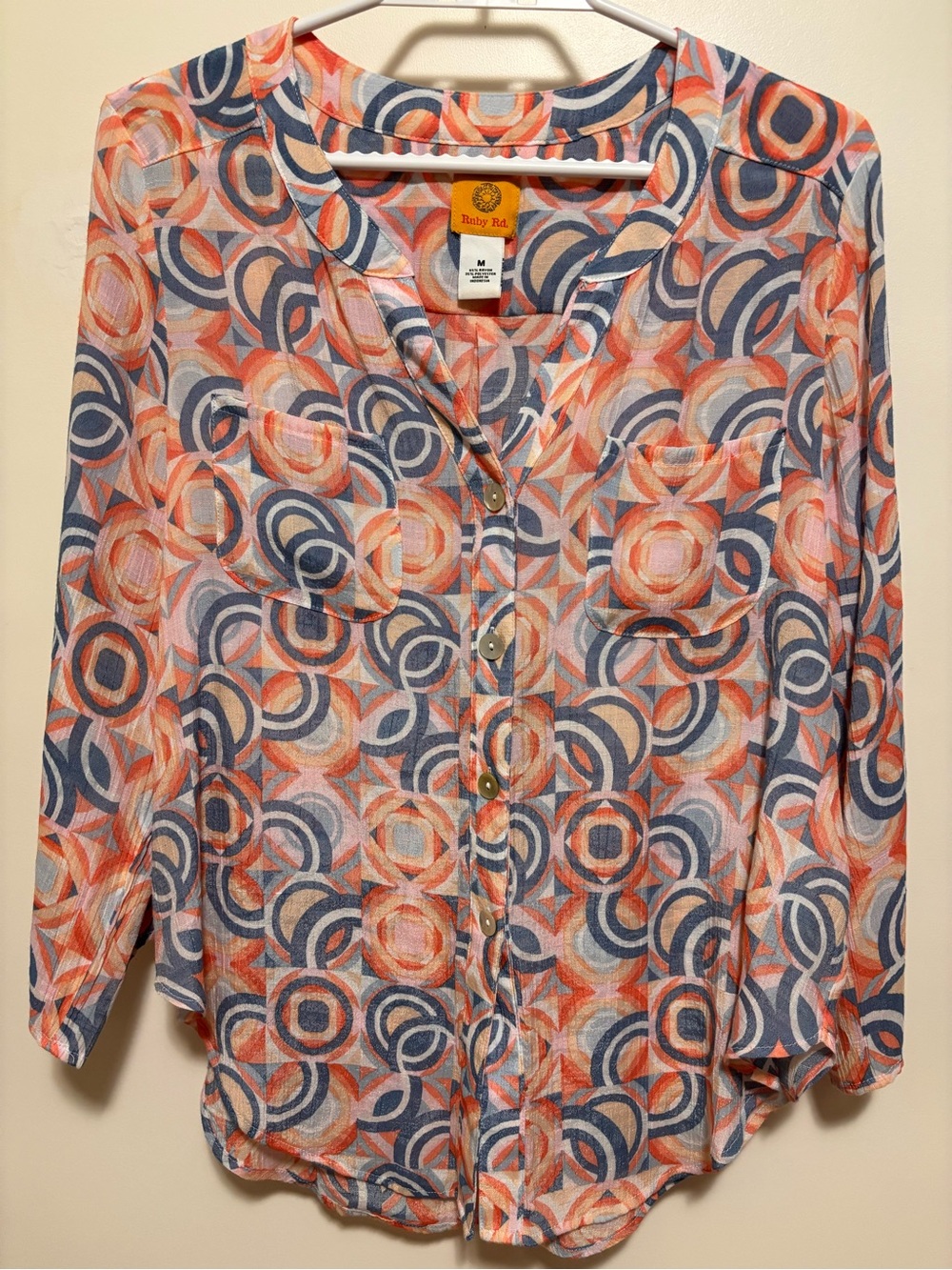 Ruby Rd. Top features a lively geometric pattern with a mix of pink and blue hue